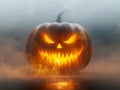 Glowing Jack-o\'-Lantern with Sharp Teeth in Fog Royalty Free Stock Photo