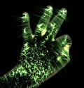 Glowing kirlian aura photography with green corona of a male human hand