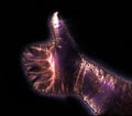 Glowing kirlian coronal aura photography with blue and purple colors of a male human hand Royalty Free Stock Photo