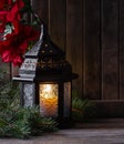 Glowing Lantern on Rusic Wooden Background