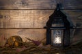 Glowing Lantern on Wood Background