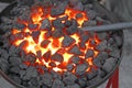 Glowing lava in the grate of the blacksmith