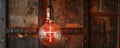 Glowing Light Bulb With a Cross Inside Hanging From Brick Wall Royalty Free Stock Photo