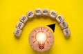 Glowing light bulb drawing on level indicator rating button with percentage for creative thinking and problem solving solution Royalty Free Stock Photo