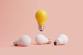 Glowing light bulb flies among white light bulbs on a pastel background Royalty Free Stock Photo