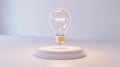 Glowing Light Bulb Hovering Above a Circular White Podium Platform Royalty Free Stock Photo