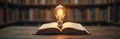 Glowing light bulb on open book in library. Learning, education, idea generation, creativity, knowledge, research, inspiration, Royalty Free Stock Photo