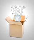 Glowing light bulb over open cardboard box Royalty Free Stock Photo