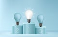 Glowing light bulb podium on minimal scene, Sustainable energy efficient concept, business idea competition Royalty Free Stock Photo