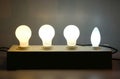 Glowing light bulb in row Royalty Free Stock Photo