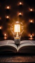 Glowing light bulbs create warm ambiance atop open book, casting radiant golden light