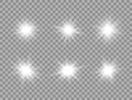 Glowing light effect on transparent background. White star explosion set. Sun flash with rays and spotlight. Bright star Royalty Free Stock Photo