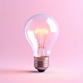 Glowing Lightbulb on Pink Background Royalty Free Stock Photo