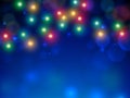 Glowing lights on blue background. Vintage greeting card merry christmas and happy new year. Colourful and golden christmas lights Royalty Free Stock Photo