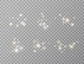 Glowing lights effect set on transparent background. Glitter light. Gold and white magic particles. Star burst with Royalty Free Stock Photo