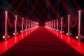 Glowing lights illuminate an empty red carpet fashion runway Royalty Free Stock Photo