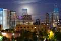 Glowing Moon Rises Behind The Denver Skyline Royalty Free Stock Photo