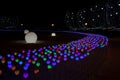 Glowing multi-colored balls, a festive decoration of the city