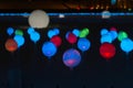 Glowing multi-colored balls, a festive decoration of the city
