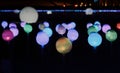 Glowing multi-colored balls, a festive decoration of the city