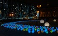 Glowing multi-colored balls, a festive decoration of the city