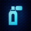 Glowing neon Aftershave bottle with atomizer icon isolated on brick wall background. Cologne spray icon. Male perfume Royalty Free Stock Photo