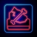 Glowing neon Archeology icon isolated on black background. Vector