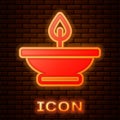 Glowing neon Aroma lamp icon isolated on brick wall background. Vector