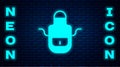 Glowing neon Barber apron icon isolated on brick wall background. Apron of a hairdresser with pockets. Vector