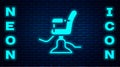 Glowing neon Barbershop chair icon isolated on brick wall background. Barber armchair sign. Vector Royalty Free Stock Photo