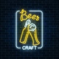 Glowing neon beer craft signboard in rectangle frame on dark brick wall background. Luminous advertising sign