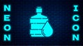 Glowing neon Big bottle with clean water icon isolated on brick wall background. Plastic container for the cooler Royalty Free Stock Photo