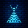 Glowing neon Billiard cue and balls in a rack triangle icon isolated on brick wall background