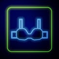 Glowing neon Bra icon isolated on blue background. Lingerie symbol. Vector Royalty Free Stock Photo