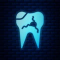 Glowing neon Broken tooth icon isolated on brick wall background. Dental problem icon. Dental care symbol. Vector