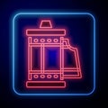 Glowing neon Camera vintage film roll cartridge icon isolated on black background. 35mm film canister. Filmstrip