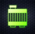 Glowing neon Car radiator cooling system icon isolated on brick wall background. Vector