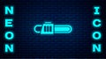 Glowing neon Chainsaw icon isolated on brick wall background. Vector Illustration Royalty Free Stock Photo