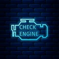 Glowing neon Check engine icon isolated on brick wall background