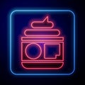 Glowing neon Cream or lotion cosmetic tube icon isolated on blue background. Body care products for men. Vector