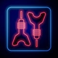 Glowing neon Dart arrow icon isolated on black background. Vector