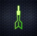 Glowing neon Dart arrow icon isolated on brick wall background. Vector