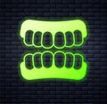 Glowing neon Dentures model icon isolated on brick wall background. Teeth of the upper jaw. Dental concept. Vector Royalty Free Stock Photo