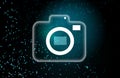 Glowing neon digital camera icon on dark abstract background with bright dots