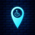 Glowing neon Disabled Handicap in map pointer icon isolated on brick wall background. Invalid symbol. Wheelchair Royalty Free Stock Photo