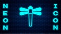 Glowing neon Dragonfly icon isolated on brick wall background. Vector Royalty Free Stock Photo