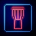 Glowing neon Drum icon isolated on black background. Music sign. Musical instrument symbol. Vector