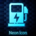 Glowing neon Electric car charging station icon isolated on brick wall background. Eco electric fuel pump sign. Vector Royalty Free Stock Photo