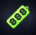 Glowing neon Electric extension cord icon isolated on brick wall background. Power plug socket. Vector Royalty Free Stock Photo