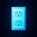 Glowing neon Electrical outlet in the USA icon isolated on brick wall background. Power socket. Vector Royalty Free Stock Photo